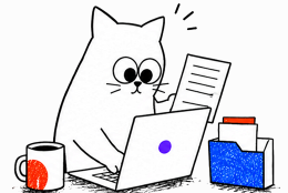 Galuh reviewing a document at a laptop